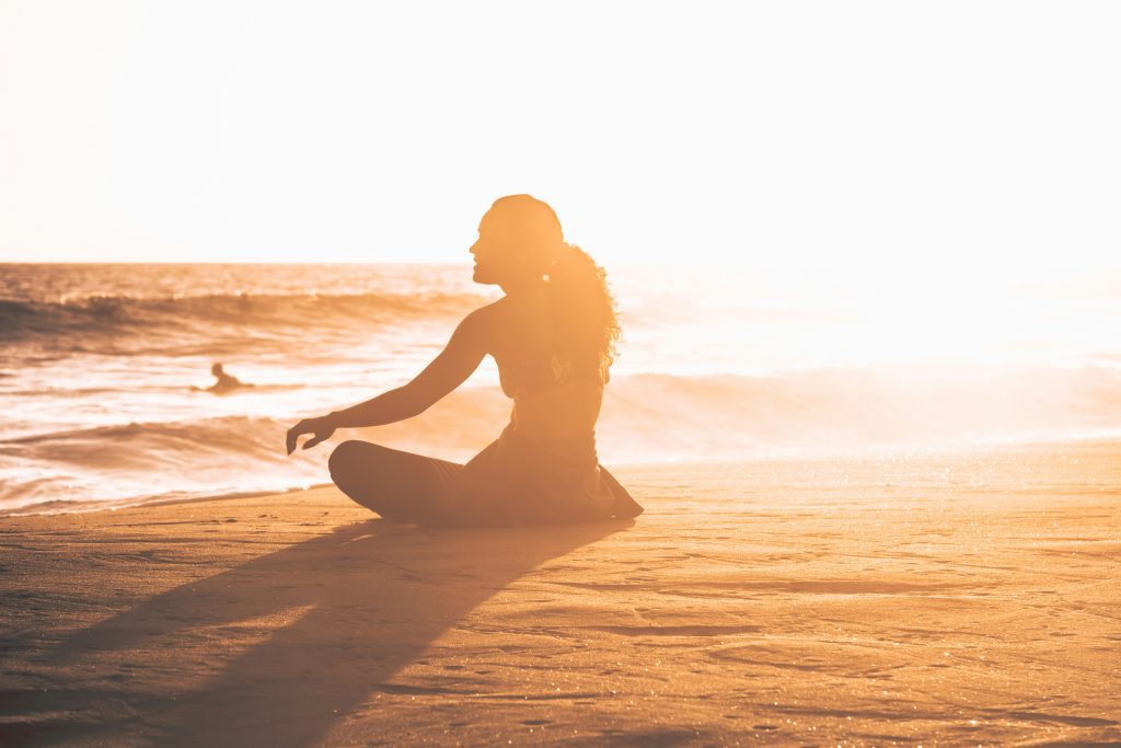 Yoga on the beach. Source: Unsplash